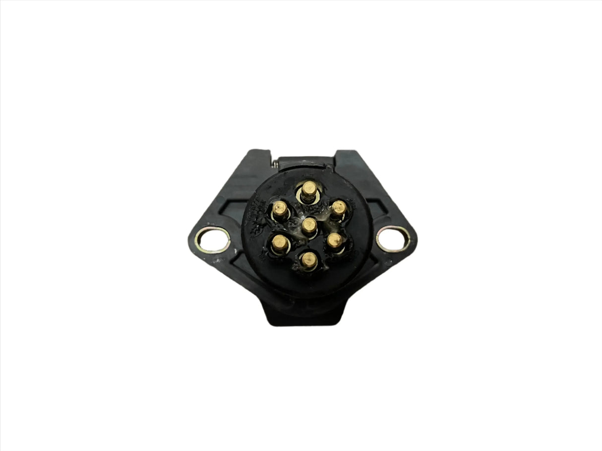 Black 7-pin circular connector socket with gold contacts on white background