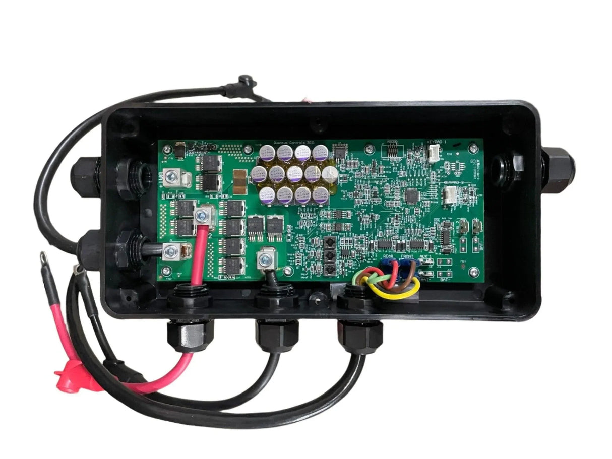 Waterproof electronic control box with exposed green circuit board and multiple wiring cables