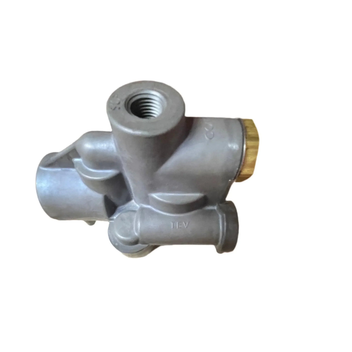Industrial metal valve with threaded ports and brass cap on a white background