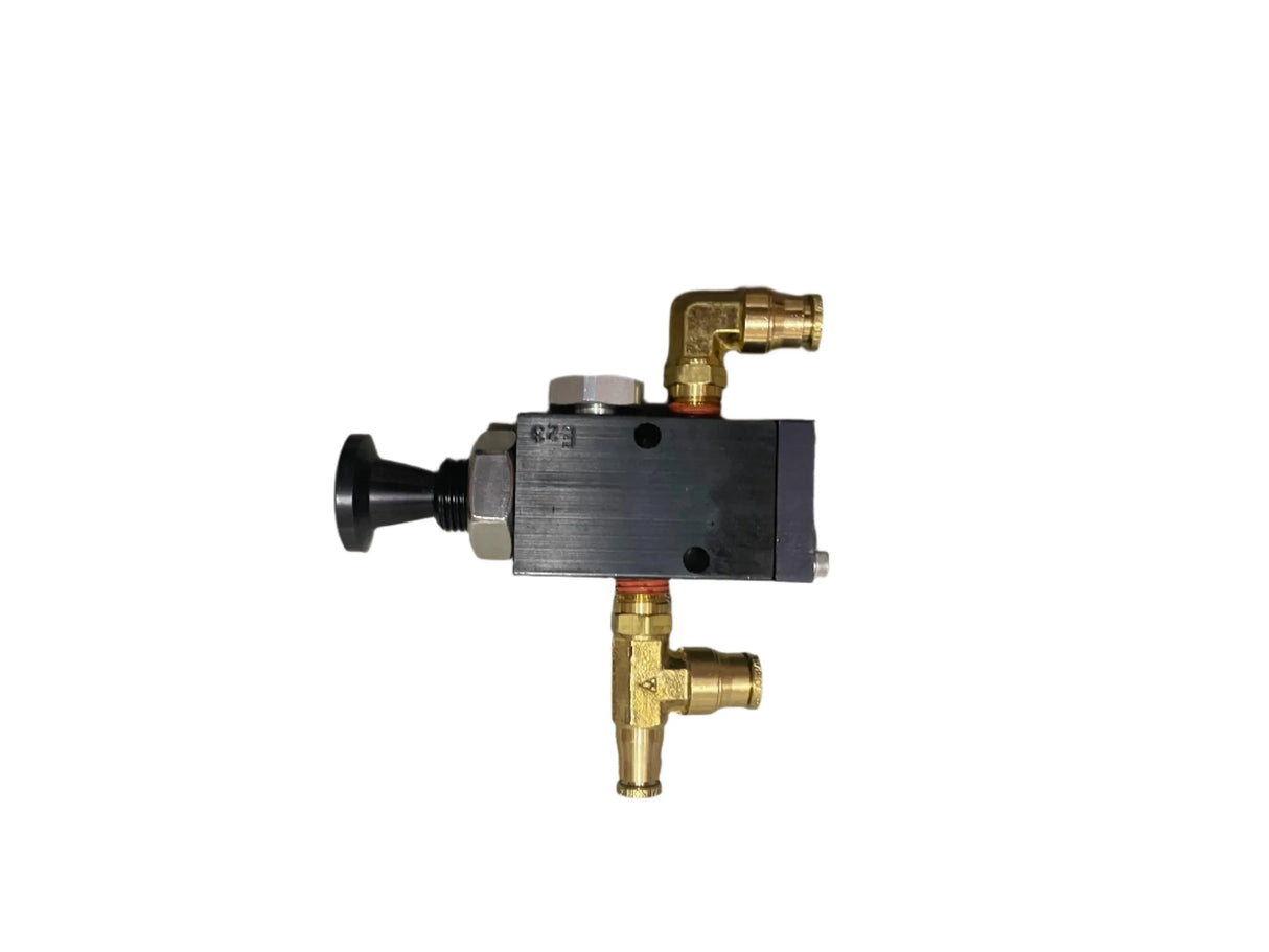 Brass and black pneumatic control valve with fittings on white background