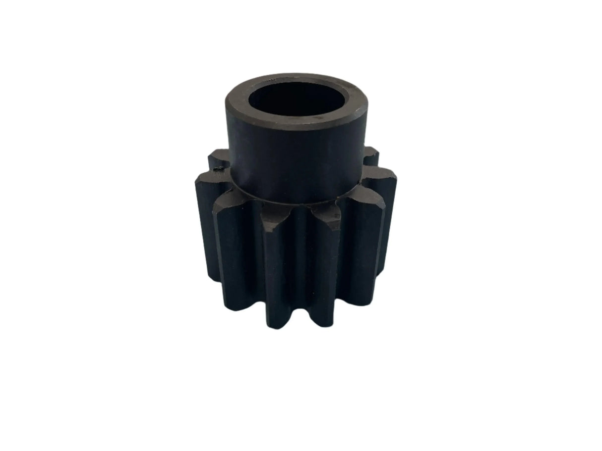 Black metal gear with straight teeth on white background, industrial machine part