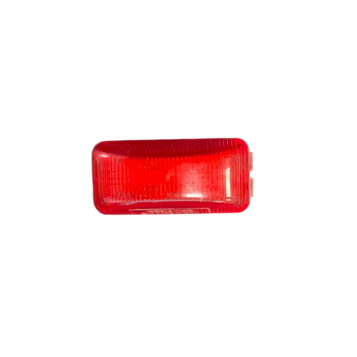 Red rectangular car side marker light on a white background