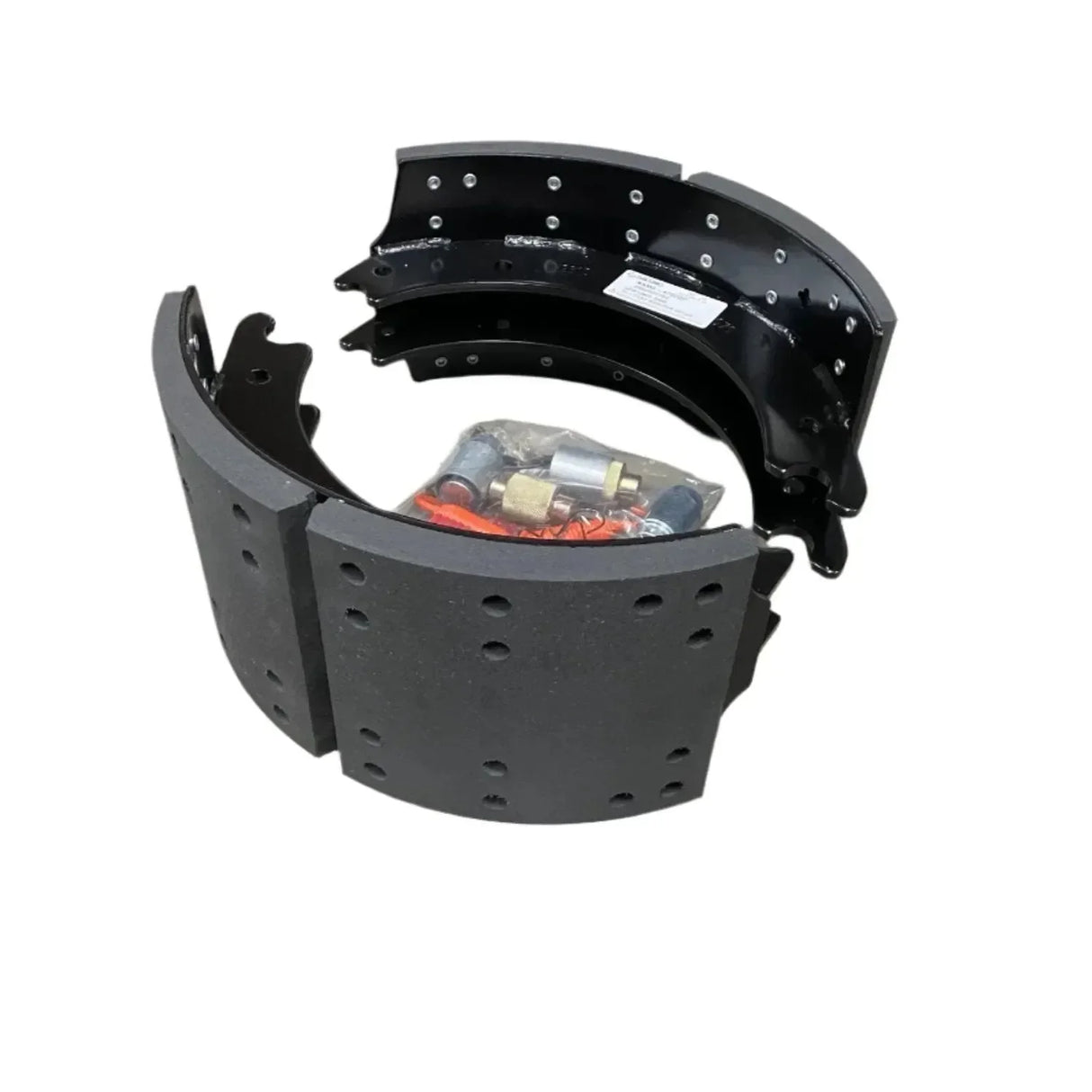 Heavy duty truck brake shoes with hardware kit on white background