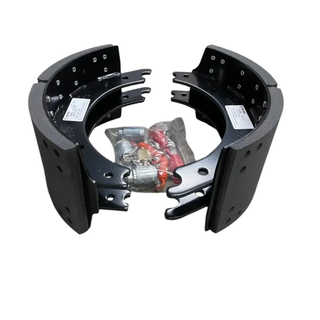 Heavy duty truck brake shoes with hardware kit on white background