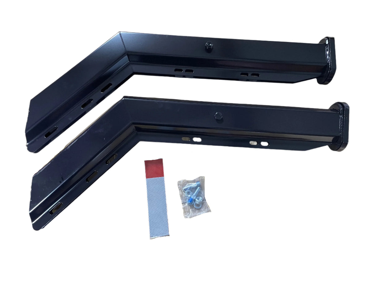 Black metal mounting brackets with screws and adhesive strip on white background