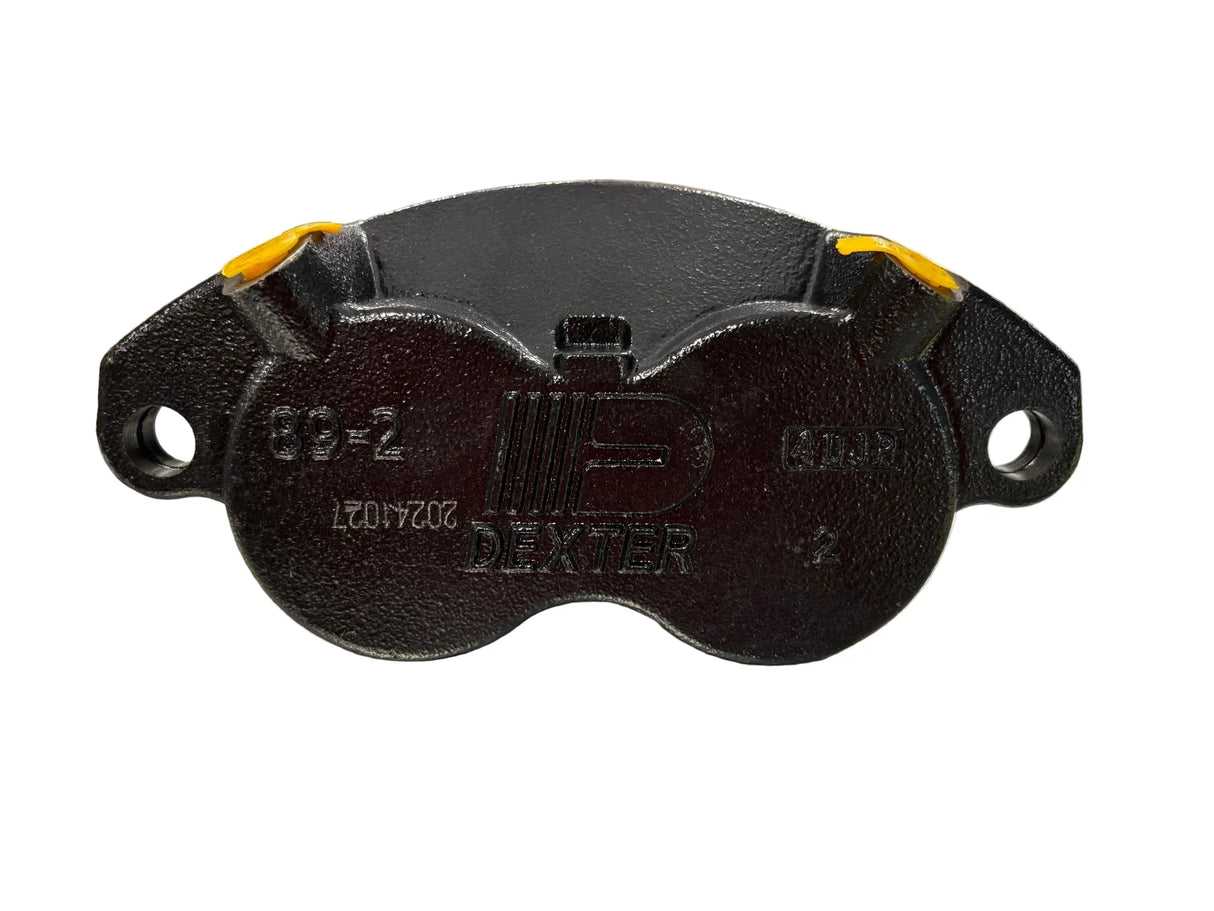 Black brake caliper with 'Dexter' branding