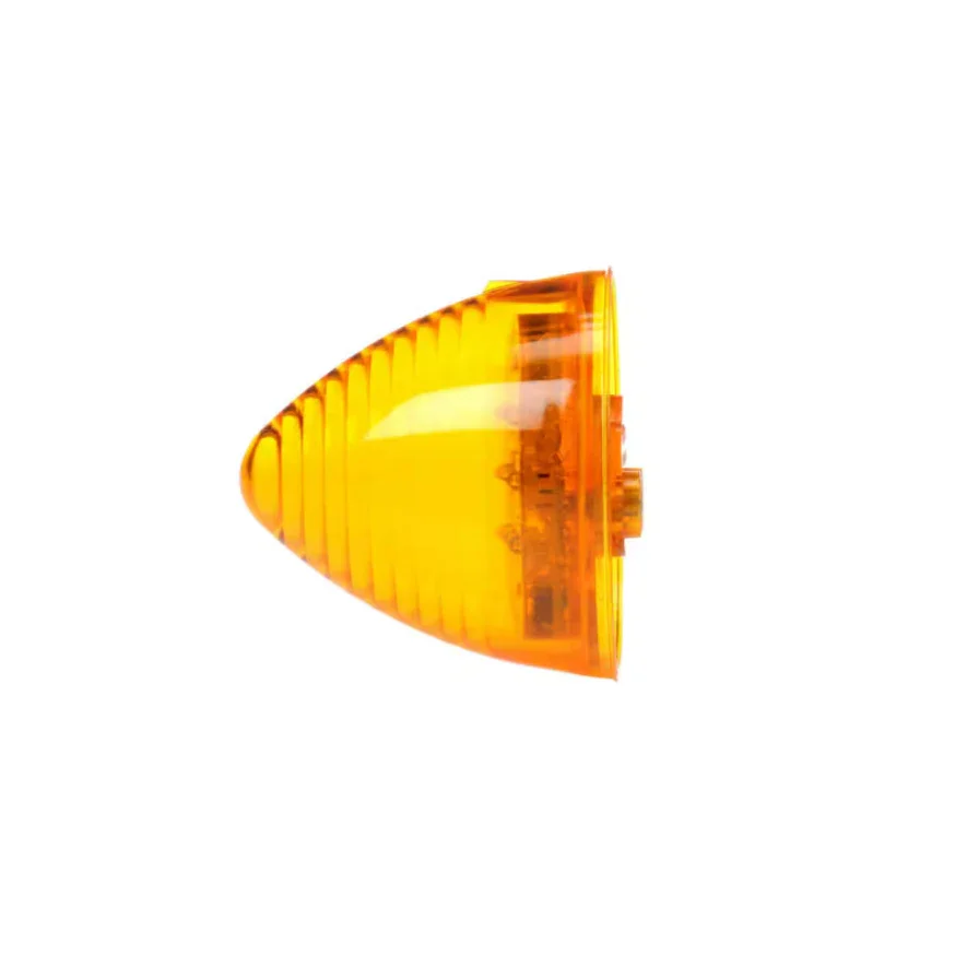 Amber motorcycle indicator light lens isolated on white background
