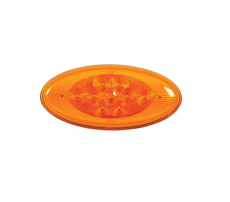 Oval amber LED truck marker light with clear lens on white background