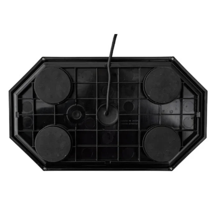 underside view of black plastic electronic device with four round feet and center cable