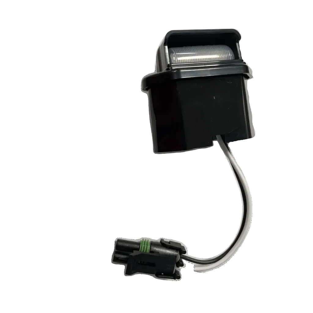 Timpte License Plate Light (030-62839) — LED license plate light with wiring harness and mounting screws, on white background