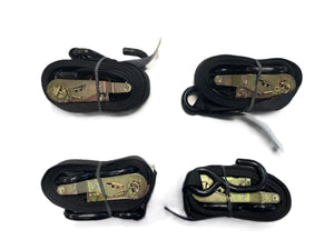 Set of four black ratchet tie down straps with hooks on white background