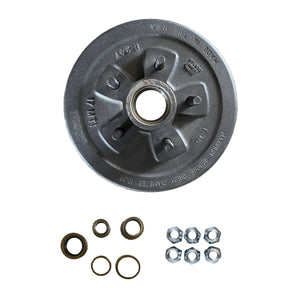 Trailer hub and drum assembly kit with bearings, washers, and nuts on white background