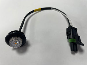 LED indicator light with wiring harness and black waterproof connector on white background