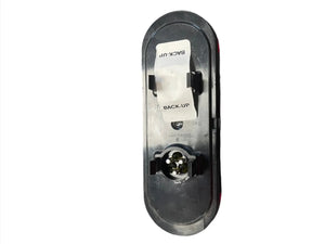 Oval black LED trailer backup light with labeled BACK-UP socket on white background