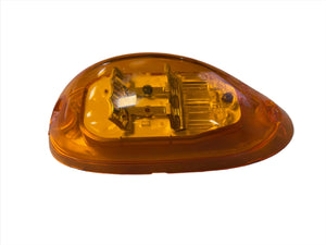 Amber oval LED side marker light for truck or trailer, isolated on white background