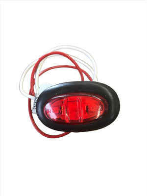 Red oval LED trailer marker light with black trim and attached red and white wires