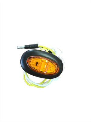 Oval amber LED side marker light with black housing and attached yellow wiring
