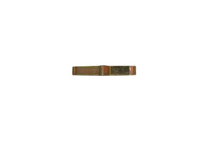 Brass metal key blank on white background, locksmith tool, hardware supply