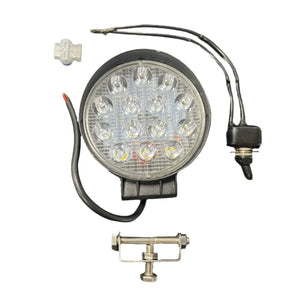 Round LED work light with wiring, switch, and mounting bracket, isolated on white background