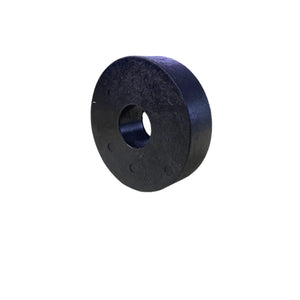 Black rubber spacer or washer with central hole on white background