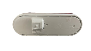 Oval plastic base with mounting clip, labeled 'Proudly Made in USA', white on white background