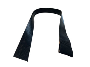 Black leather strop on white background, sharpening tool for straight razors