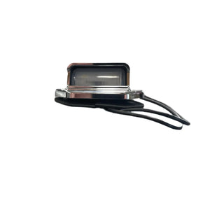 chrome license plate light with wiring on white background