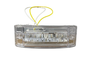 Clear LED license plate light with yellow and white wires on a white background