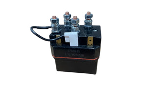 Black automotive relay solenoid with multiple terminals and wiring on white background