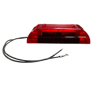 Red LED trailer clearance marker light with two attached black wires on white background