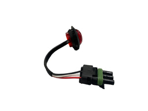Red LED indicator light with wiring harness and black connector, isolated on white background