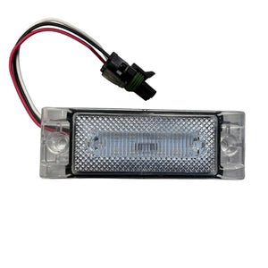 Clear rectangular LED license plate light with wiring and black electrical connector