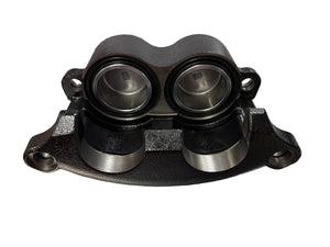 Black metal dual piston brake caliper for automotive disc brake systems on white background