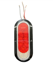 Sure-Trac ST11207 Enclosed Trailer Tail Light — oval LED tail light with red and clear lens, black housing, and exposed wires, on white background
