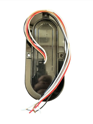 Black oval LED trailer light with red, white, and black wires on white background