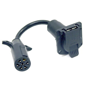 7-way trailer wiring adapter with round and rectangular black connectors on white background