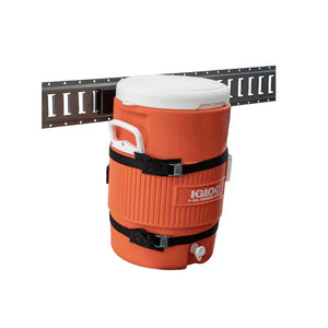 Igloo 5-gallon orange water cooler mounted on wall track with straps