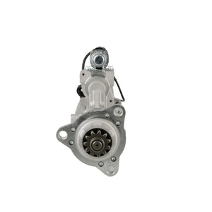 Front view of a silver automotive starter motor with gear and wiring on white background