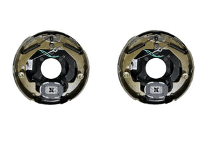 Pair of replacement trailer brake assemblies on white background