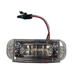 Clear rectangular LED trailer marker light with wiring and connector on white background