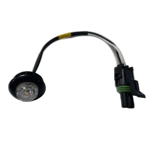 Round LED marker light with black housing and wiring harness connector on white background